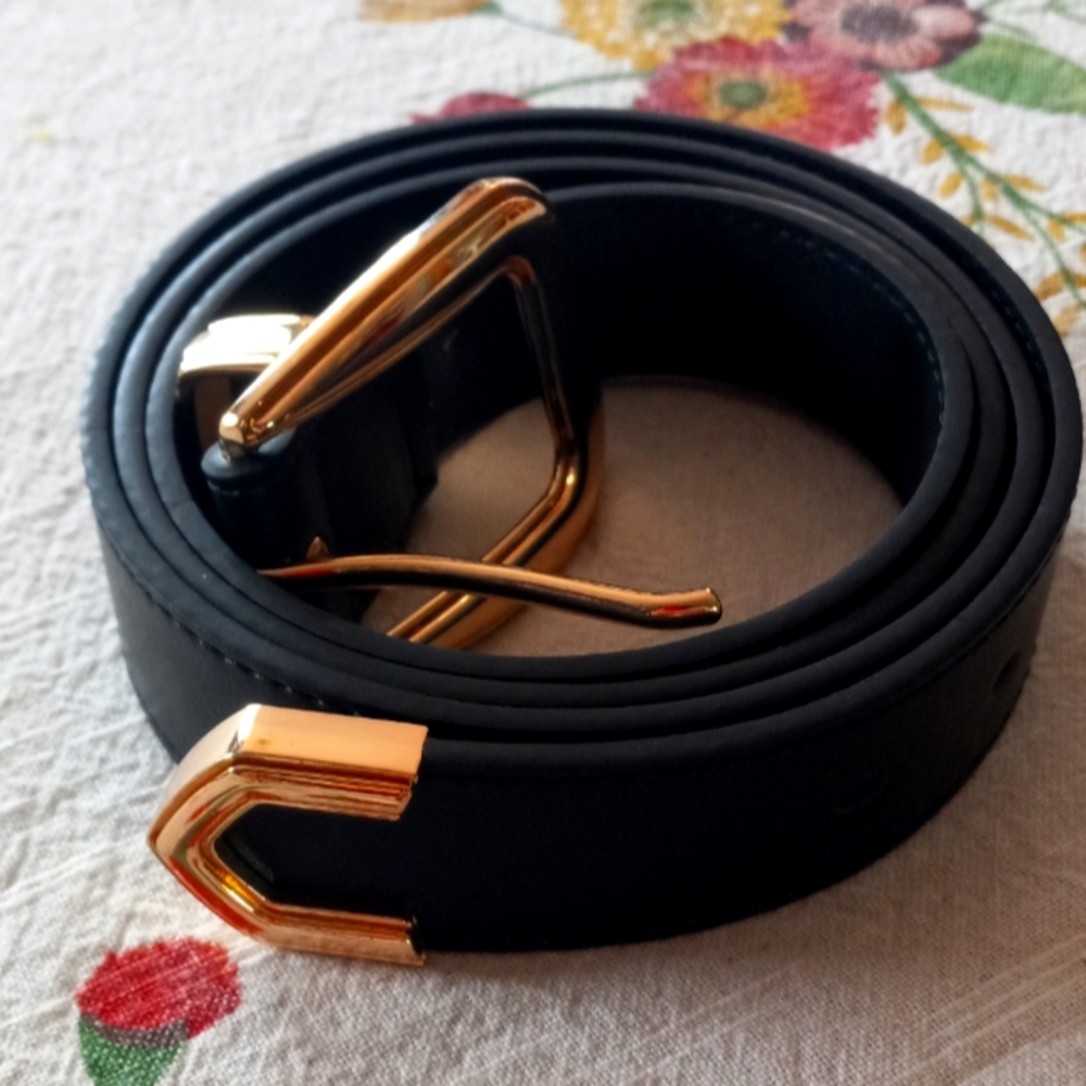 Black belt gold color clasp